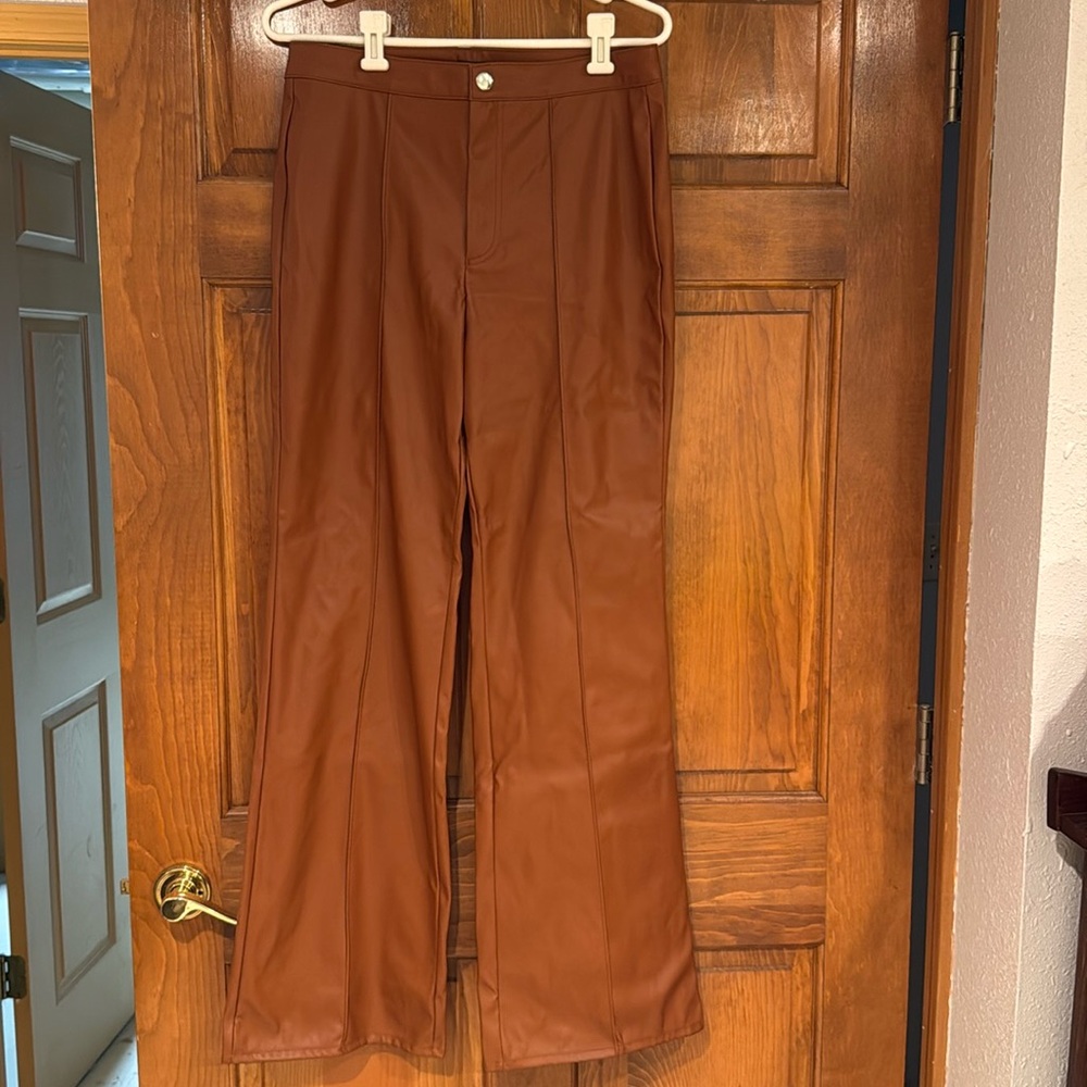 New with tags. Pleather pants. Great for fall and the holidays.
